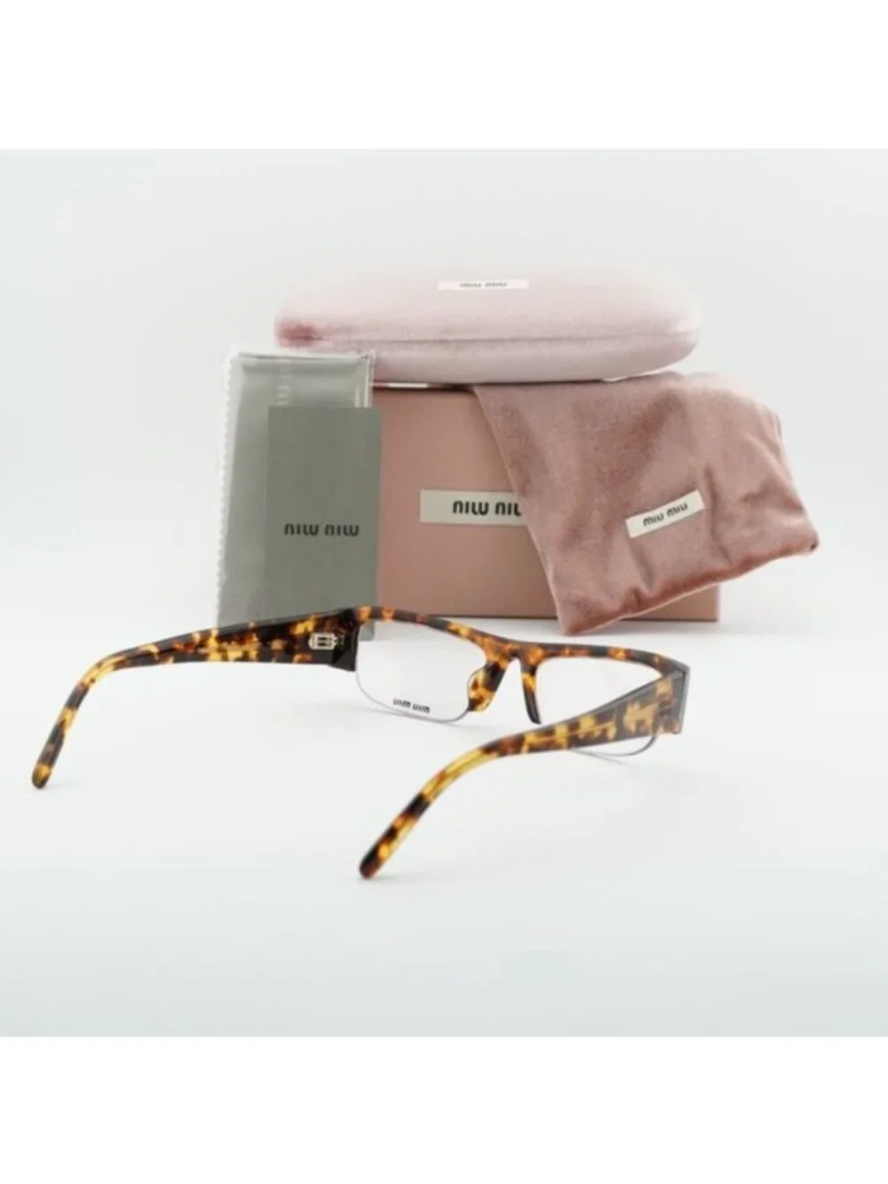 Miu Miu MUB07S 14L08N Rectangle Sunglasses – Havana/Blue-Violet Light Filter